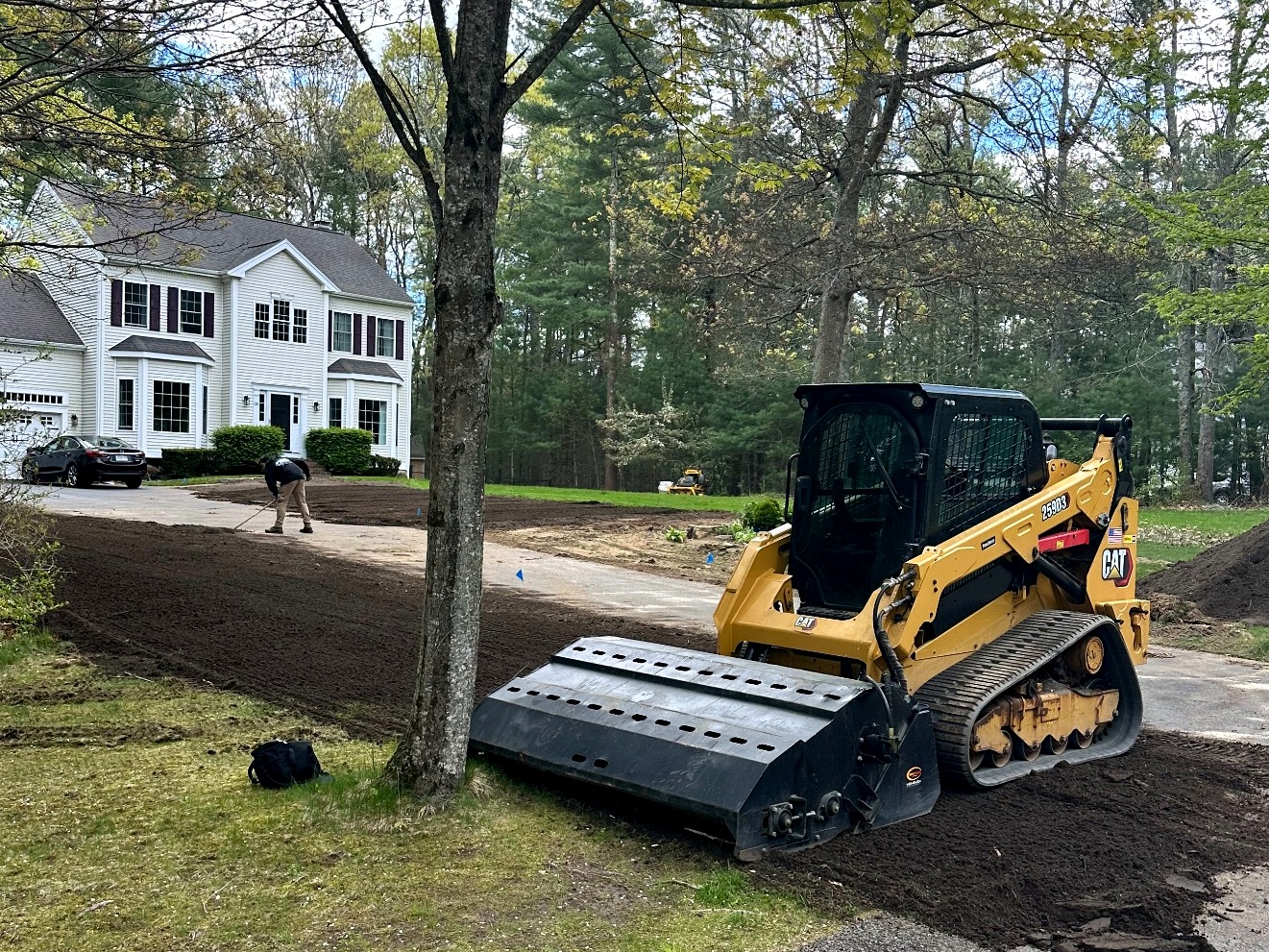 outdoor-oasis-skid-steer-new-lawn-installation-south-shore-ma-4x3